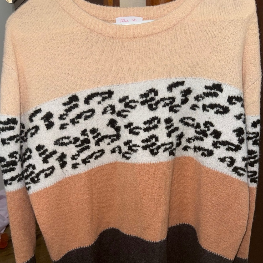 size small Pink extremely warm sweater absolutely beautiful